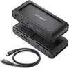 A black JSAUX docking station with a USB-C cable is shown against a white background. Produktbild-Vorschau