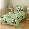 A child's bed with panda-themed bedding. Produktbild-Vorschau