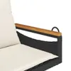 Close-up of a black rattan hanging chair with a beige cushion and a wooden armrest. Náhled obrázku produktu