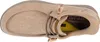 A top-down view of a tan Skechers slip-on shoe. Náhled obrázku produktu