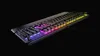 A black gaming keyboard with RGB lighting against a black background. Produktbild-Vorschau