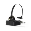 A black and gold Bluetooth headset with a microphone sits on its charging base against a white background. Produktbild-Vorschau