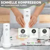 A person is holding a white electric vacuum pump over a compressed bag. Produktbild-Vorschau