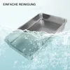A stainless steel litter box partially submerged in water with bubbles, suggesting easy cleaning. Produktbild-Vorschau