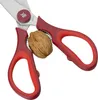A pair of red kitchen scissors is shown with a walnut placed between the blades. Produktbild-Vorschau