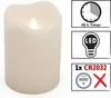 A cream-colored LED candle with a flickering flame, shown next to icons indicating timer, LED technology, and battery type. Produktbild-Vorschau