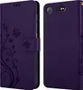 A purple flip case for a Sony Xperia XZ1 Compact phone, shown from the front and back. Náhľad obrázku produktu