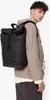 A person wearing a backpack. Voir les images du produit