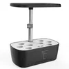 A black and white indoor smart garden system with an adjustable LED grow light. Produktbild-Vorschau