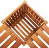 A close-up view of the corner of a wooden garden bench with a planter. Produktbild-Vorschau