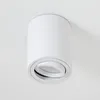 A white cylindrical ceiling light fixture mounted on a white ceiling. Náhled obrázku produktu