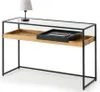 A console table with a glass top, wooden shelf, and black metal frame, featuring a lamp and a tray with a notebook. Podgląd zdjęcia produktu