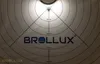 A light fixture is mounted on a surface with concentric circles and radial lines, indicating measurements. Produktbild-Vorschau