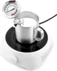 A stainless steel pitcher filled with milk sits on a white induction cooktop, with a thermometer inserted into the milk. Produktbild-Vorschau