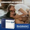 A couple in an intimate embrace, with a product box in the foreground. Produktbild-Vorschau