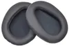 Two black ear pads for headphones are shown against a white background. Produktbild-Vorschau
