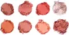 Eight circular swatches of crushed makeup powder in various shades of pink, coral, peach, and brown, arranged in two rows of four. Produktbild-Vorschau