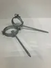 Two metal pipe clamps with spikes are shown on a white background. Produktbild-Vorschau