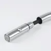 A close-up shot of a kitchen faucet spray head and hose. Anteprima dell’immagine prodotto