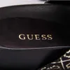 A close-up view of the inside of a black shoe, showing the brand name. Podgląd zdjęcia produktu