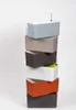 A stack of six self-watering planters in different colors. Náhled obrázku produktu