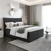 A modern bedroom with a large bed, nightstand, and decorative wall art. Produktbild-Vorschau