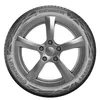 A close-up studio shot of a car tire mounted on a silver rim, presented against a white background. Podgląd zdjęcia produktu
