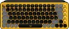 A top-down view of a yellow and black Logitech POP Keys mechanical Bluetooth keyboard with round keys and emoji keycaps. Produktbild-Vorschau