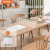 A dining table with a clear PVC protector and place settings. Podgląd zdjęcia produktu