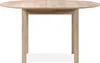 A simple, front-facing shot of a round wooden dining table against a white background. Voir les images du produit