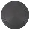 A top-down view of a round, dark gray heat diffuser plate with concentric rings on its surface. Produktbild-Vorschau