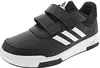 A black Adidas shoe with white stripes and velcro straps. Podgląd zdjęcia produktu