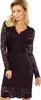 A woman wearing a black lace dress. Náhled obrázku produktu