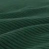 A close-up, abstract view of a dark green textured surface with wavy ridges. Produktbild-Vorschau