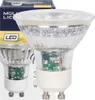 Two LED light bulbs are shown, with one in focus in the foreground and another slightly out of focus in the background. A portion of the product's packaging is visible on the left. Voir les images du produit