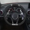 Interior of a car, focusing on the steering wheel. Anteprima dell’immagine prodotto