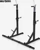 A black squat rack with silver adjustable height components, shown against a white background. Produktbild-Vorschau