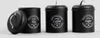 Three black storage canisters for tea, coffee, and sugar, displayed on a light gray background. Produktbild-Vorschau