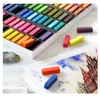 A set of Faber-Castell soft pastels in a case, with some individual pastels laid out on a surface next to a sketch. Podgląd zdjęcia produktu