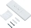 A white remote control with buttons for up, down, and stop, along with a clear plastic bracket and mounting hardware, are arranged on a white background. Náhled obrázku produktu