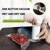 A person is using a white vacuum sealer on a bag of tomatoes. Produktbild-Vorschau