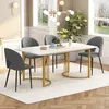 A dining set with a rectangular marble-top table and four gray upholstered chairs, set in a well-lit dining room. Produktbild-Vorschau