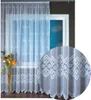 A white lace curtain with a floral pattern is displayed in front of a window. Produktbild-Vorschau