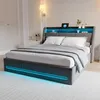 A modern bed with integrated storage and LED lighting in a bedroom setting. Produktbild-Vorschau