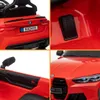 A collage of four close-up images of a red BMW M4 Competition ride-on car. Voir les images du produit