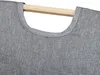A close-up view of the top of a gray fabric laundry basket with a wooden handle. Náhled obrázku produktu