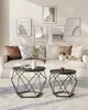 A living room scene with a sofa, coffee tables, and wall art. Podgląd zdjęcia produktu