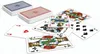 A collection of playing cards spread out on a white background, with two decks of cards in the background. Produktbild-Vorschau