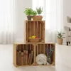 Wooden crates stacked and used for storage and decoration in a room. Náhled obrázku produktu