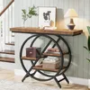 A console table with a wooden top and a geometric metal frame with shelves, placed in a home entryway next to stairs. Podgląd zdjęcia produktu